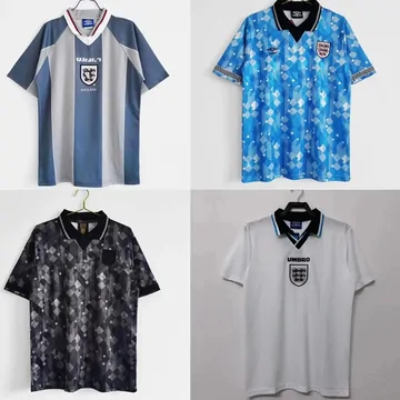 Four retro football shirts in a grid: pale blue, blue patterned, black patterned and white.