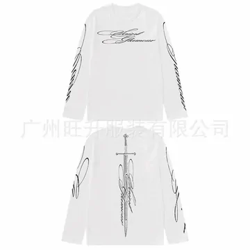A white long-sleeve T-shirt laid flat with a thin black sword print down the front and a shop watermark in Chinese.